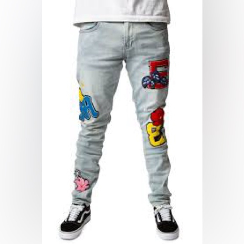 EMBELLISH
NILLE DENIM - LIGHT BLUE Colorful Graphic Patch Jeans